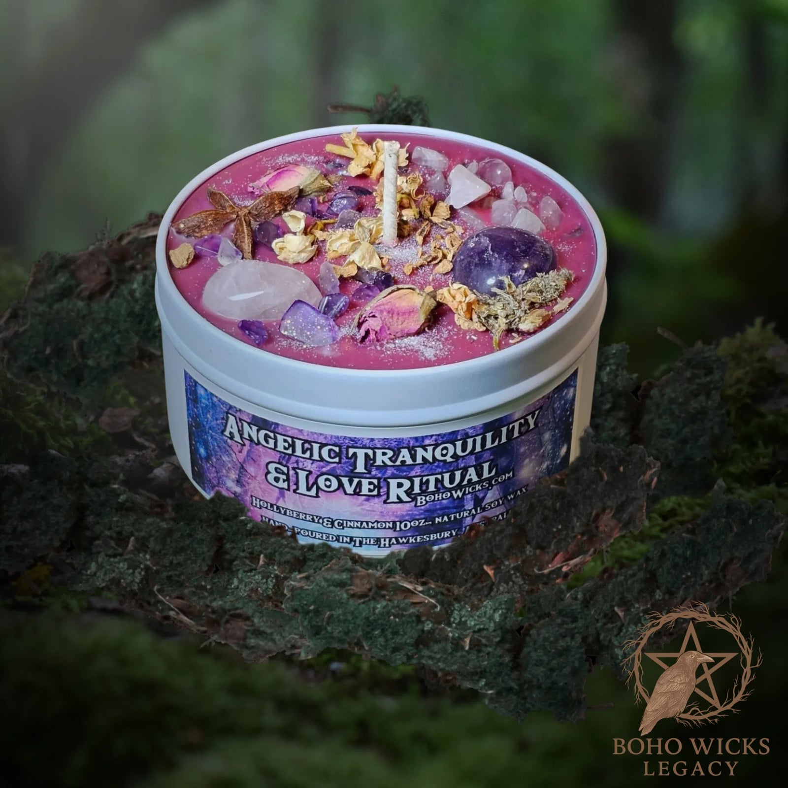 Forest setting photo of the Angelic Tranquility & Love Ritual candle with Rose Quartz, Amethyst, Angelica Root, Mugwort, and Rose surrounded by moss, fragranced with Hollyberry & Cinnamon