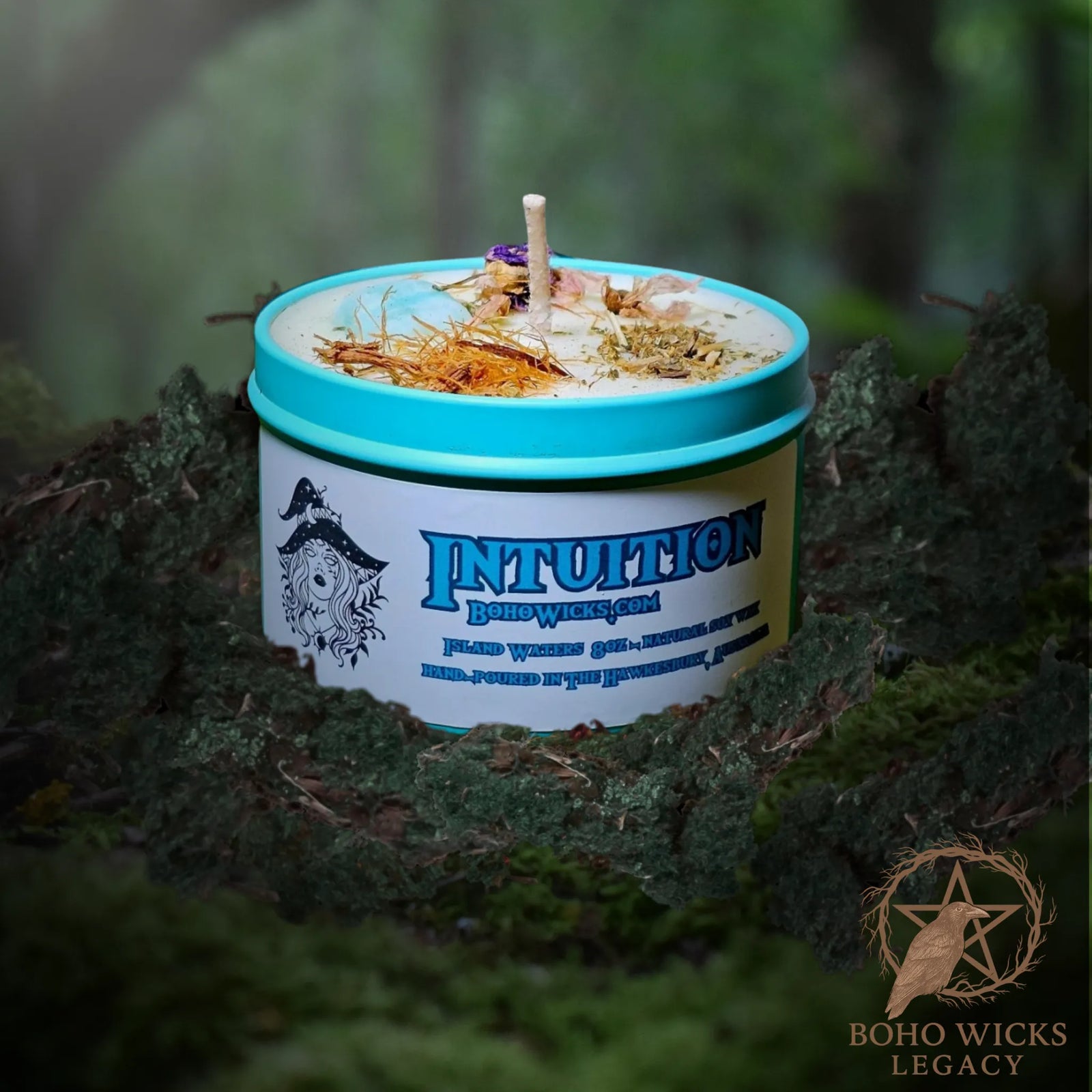 Forest setting photo of the Intuition candle with Caribbean Calcite, Passionflower, Cats Claw, and Mallow surrounded by moss, fragranced with Island Waters
