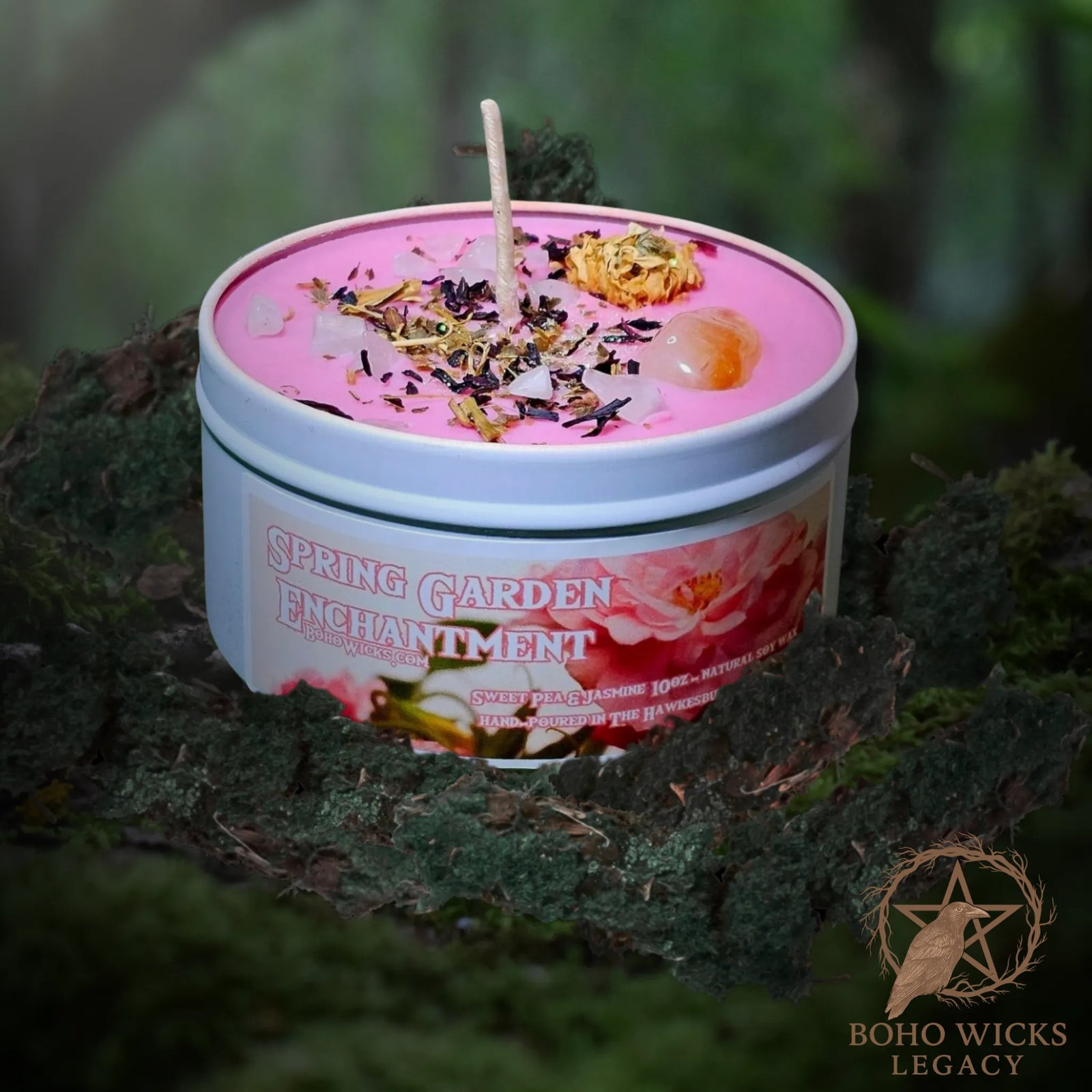 Forest setting photo of the Spring Garden Enchantment candle with Rose Quartz, Citrine, Chrysanthemum, Hibiscus, and Passionflower surrounded by moss, fragranced with Sweet Pea & Jasmine