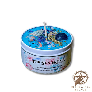Product image of The Sea Witch candle with Fluorite, Cornflowers, Skullcap, Seashells, and Sea Salt on a white background, fragranced with Alchemy