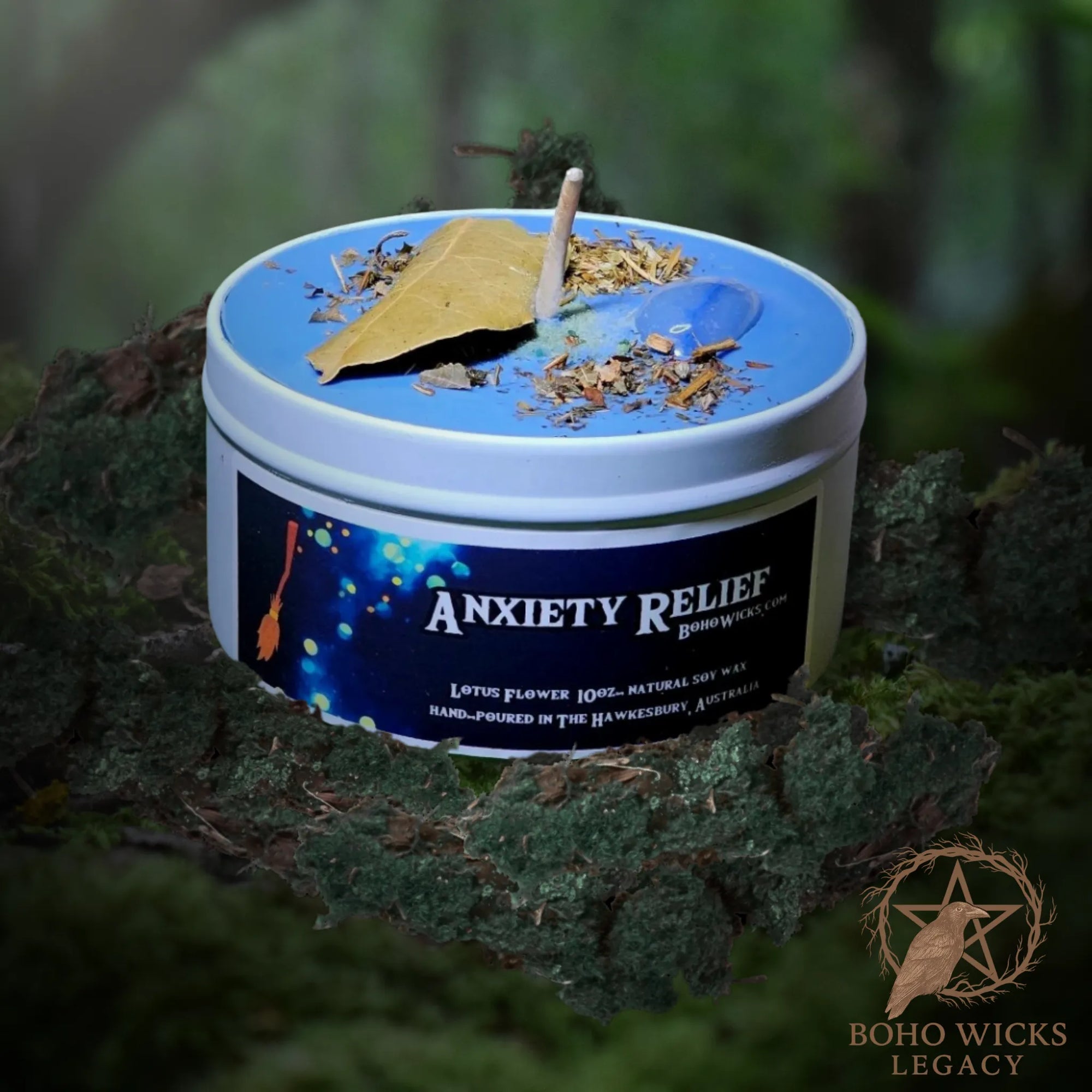 Forest setting photo of the Anti-Anxiety candle with Blue Quartz, Lemon Balm, Oat Straw, Agrimony, and Myrrh surrounded by moss, fragranced with Lotus Flower


