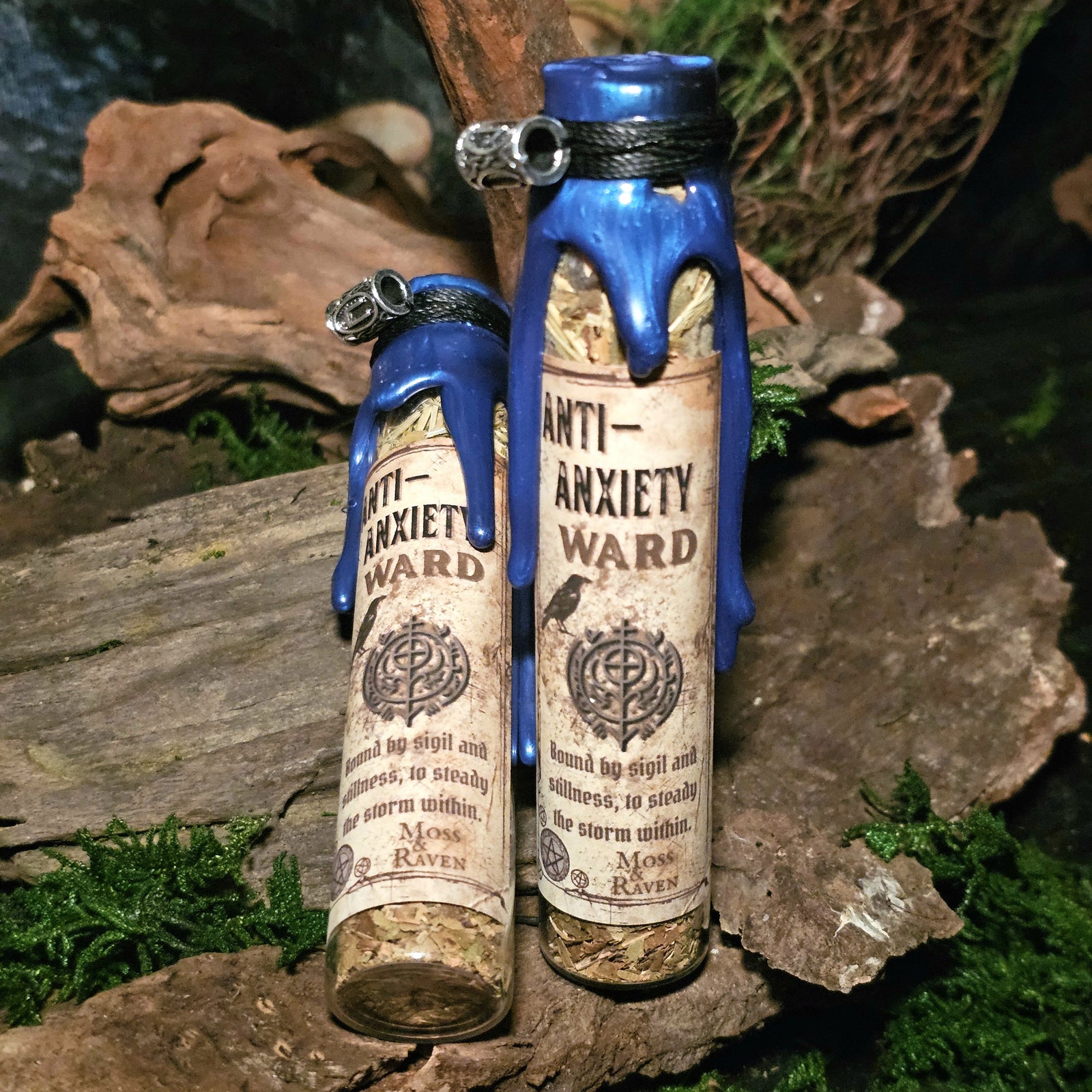 Anti-Anxiety Ward Spell Jar with blue quartz and herbs displayed on moss