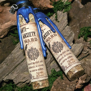 Top-down view of herbs and blue quartz layered inside the Anti-Anxiety Ward Spell Jar