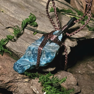 Close-up of raw blue apatite stone on natural background