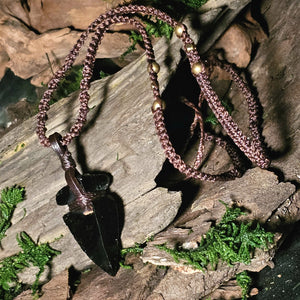 Handwoven obsidian necklace with brown waxed cord