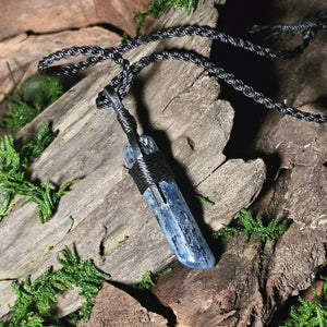 Handcrafted kyanite jewellery set on forest floor textures