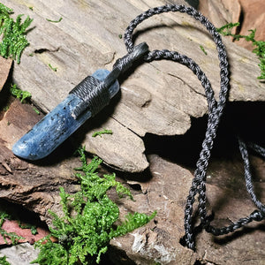 Artisan kyanite pendant on braided cord, laid in mossy setting