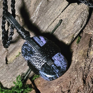 Close-up of charoite necklace showing texture and wrapping