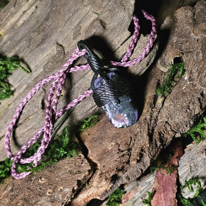 Charoite pendant wrapped in black cord with lavender accent