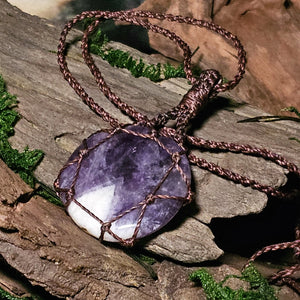 Crystal pendant aligned with Third Eye and Crown Chakras