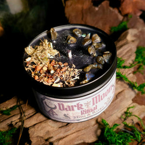 Dark Moon Ritual Candle with labradorite, myrrh, mugwort, and wormwood – black wax altar candle crafted for banishment and divination