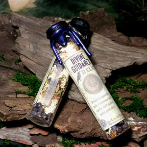 Spell jar sealed with wax on moss and stone