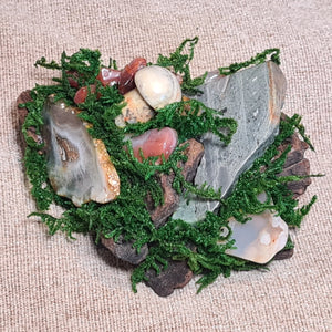 Detail of the Flame of Renewal piece showing polished agate and ocean jasper mushroom.