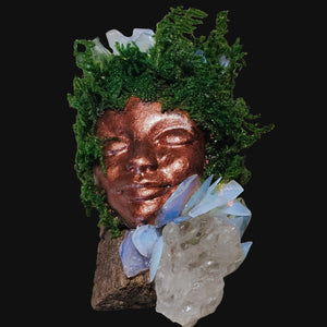 Front view of Forest Guardian resting on driftwood with shimmering Opalite and luminous Clear Quartz — witchcrafted decor for higher awareness.