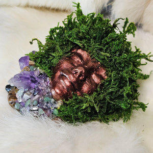 Spiritual guardian sculpture featuring amethyst and clear quartz details