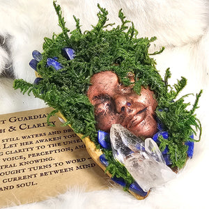 Spirit guardian artwork crafted with natural moss and crystal allies
