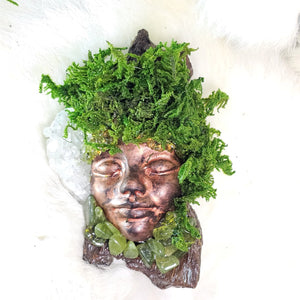 Moss covered Forest Guardian created for renewal and vitality