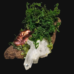 Moss-covered altar art with Peridot and Clear Quartz — handcrafted by Moss & Raven for grounding and growth.