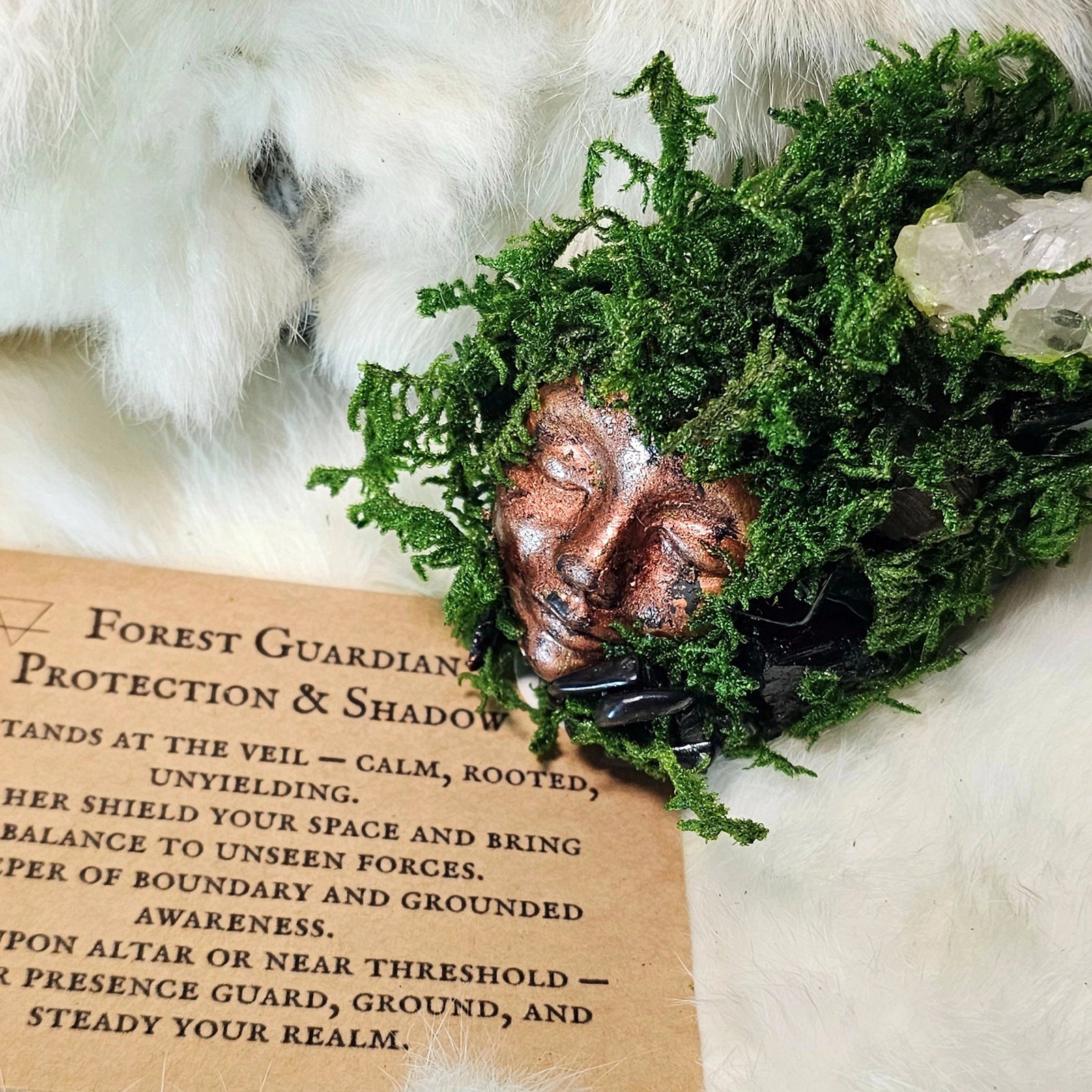 Forest Guardian sculpture with black tourmaline and quartz cluster on driftwood