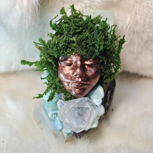 Ritual guardian artwork featuring clear quartz cluster and preserved moss