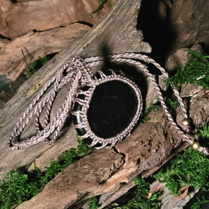 Woven jet necklace symbolising emotional strength