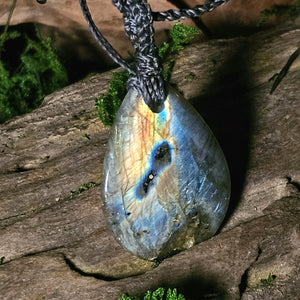 Labradorite stone glowing with iridescent blue light
