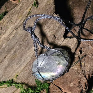 Magickal pendant with pink labradorite set in dark grey waxed thread