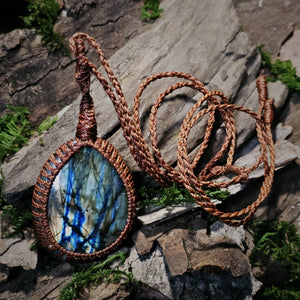 Handwoven Labradorite crystal pendant with iridescent blue flash detail