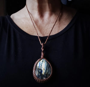 Large Labradorite pendant worn at shortest adjustable neck length with copper-brown cord