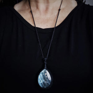 Handcrafted Labradorite talisman necklace with black cord shown at longest wearable length
