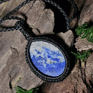 Rear view of Woven cord necklace featuring lapis lazuli crystal