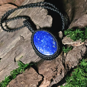 Oval lapis lazuli pendant with black cord wrap