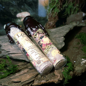 Red wax seal and charm on Love Potion Spell Jar.