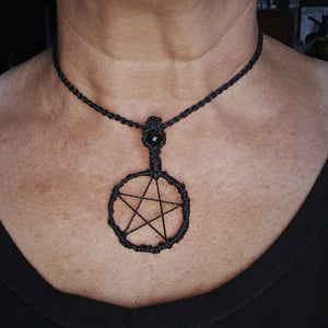 Handcrafted pentacle talisman necklace with black obsidian shown worn close to the neck #2