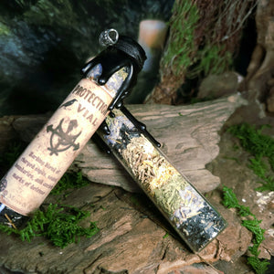 Crystals and warding herbs inside Protection Spell Jar