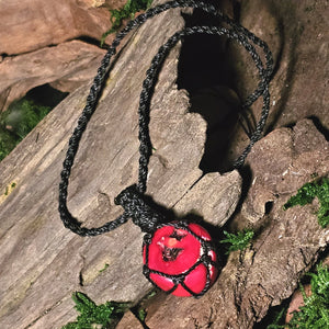 Talisman pendant representing vitality and protection