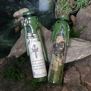 Strength Spell Jar sealed with wax on wood