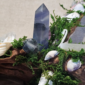 Fluorite tower surrounded by Selenite and Amethyst – The Quiet Current altar decor.
