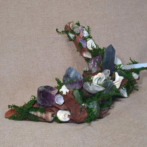 Wide shot of The Quiet Current – oceanic altar with soft greens and violets.