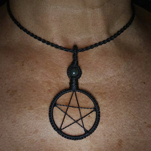 Black woven pentacle necklace shown worn close to the throat as ritual jewellery