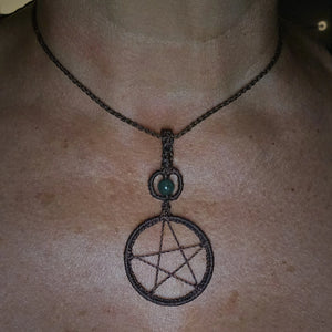 Brown ritual pentacle pendant worn close to the neck with moss agate bead