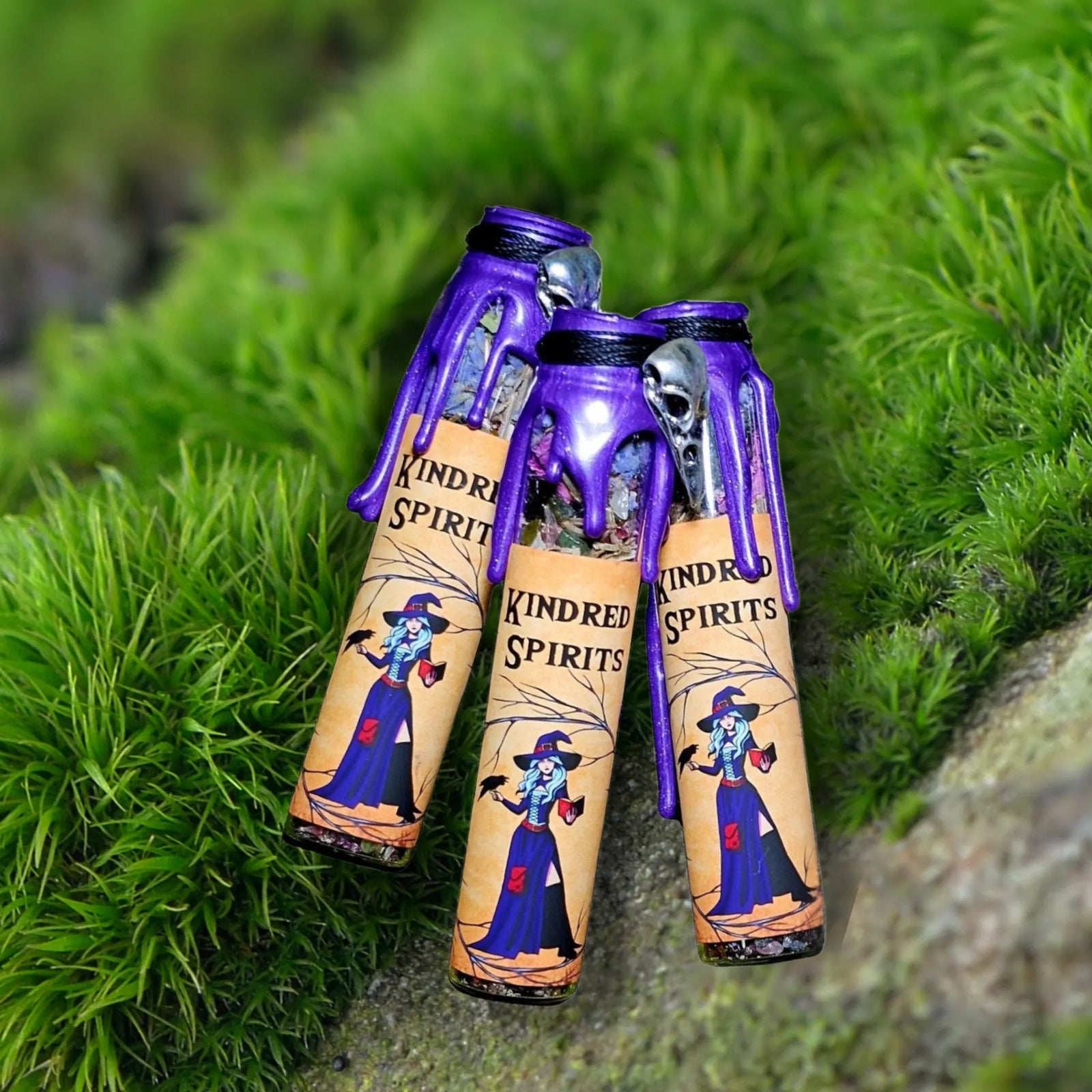 "Kindred Spirits spell jar by Moss & Raven resting on moss and stone, crafted with herbs and crystals to support soul connections and spirit communication."