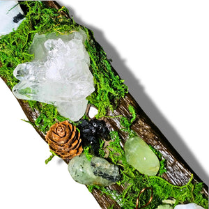Nightborne crystal forest by Moss & Raven on white background. Features Clear Quartz, Moonstone, Prehnite, spell bottle, moss, acorn, pine cone, and driftwood.