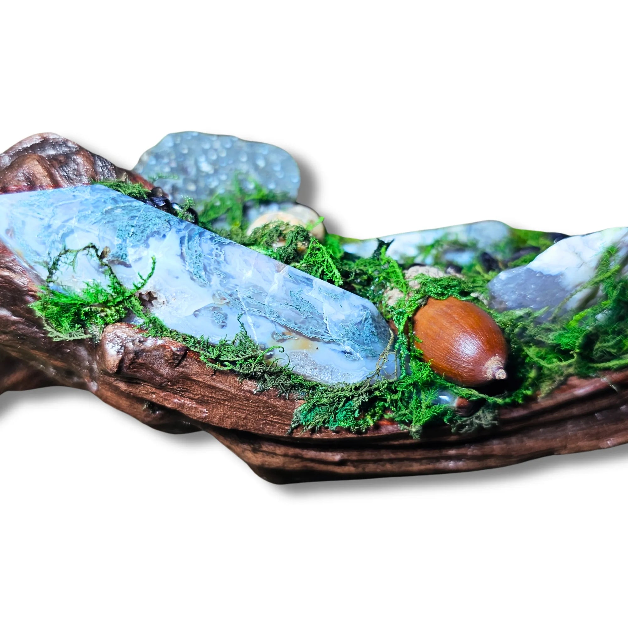 Wyrdwood crystal forest by Moss & Raven on white background. Features Moss Agate, Ocean Jasper, Smokey Quartz, Green Tourmaline, mushroom, moss, driftwood, acorn, and pine cone.